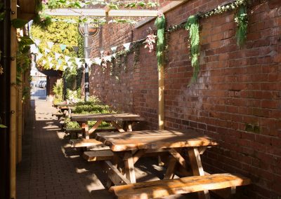 The Swan Cheltenham outside seating area - sunny beer garden